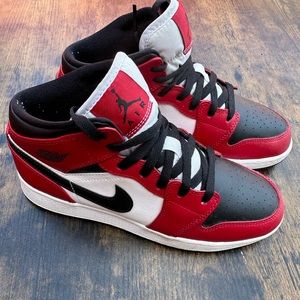 Jordan 1 Mid. Chicago black toe.